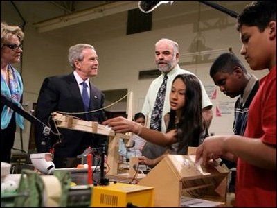 President Bush and Secetary Spellings visit with a teacher and students at Parkland Magnet Middle School for Aerospace Technology in Rockville, Maryland.  White House photo by Kimberlee Hewitt