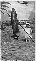 H0020-4. Gerald R. Ford, Jr. (then known as Leslie Lynch King, Jr.) holding a fishing rod, poses for portrait. February 1915.