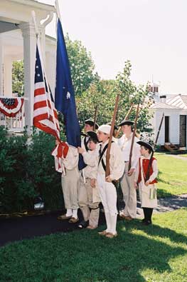 Visitors in period dress at Lansing Manor.