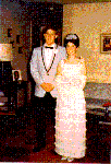 H0072-11. Mike Ford poses with his prom date in the living room of the family residence at 514 Crown View Drive, Alexandria, VA. 1968.