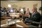 President George W. Bush and Prime Minister Recep Tayyip Erdogan of Turkey talk to the press in the Oval Office Monday, October 2, 2006. "We had an important discussion about both Iraq and Iran. Our desire is for -- to help people who care about a peaceful future to reject radicalism and extremism," said President Bush. White House photo by Eric Draper