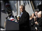 President George W. Bush addresses his remarks in honor of his father, former President George H. W. Bush, at the commissioning ceremony of the USS George H.W. Bush (CVN 77) aircraft carrier Saturday, Jan 10, 2009 in Norfolk, Va. White House photo by Eric Draper