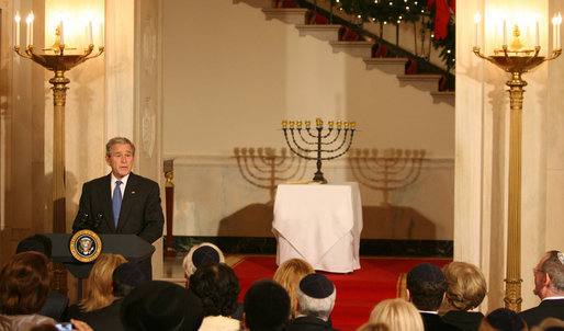 President George W. Bush delivers remarks during the lighting of the Menorah Monday, Dec. 15, 2008, in the Grand Foyer of the White House. This year's Menorah, currently housed at the Harry S. Truman Presidential Library in Independence, Mo., was a gift from Israel's first Prime Minister David Ben-Gurion to the U.S. President on May 7, 1951 - President Truman's birthday - to personally thank him for his important, and then-controversial recognition of Israel's independence three years prior. White House photo by Shealah Craighead