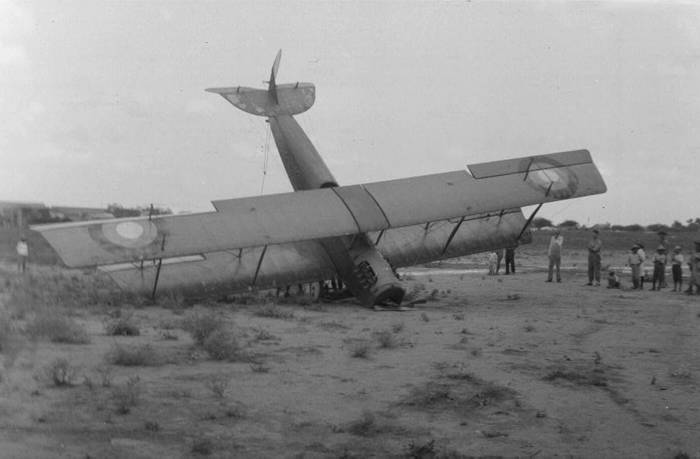 Biplane crash.