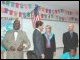 Secretary Spellings and Governor Perry with staff and students of Pin Oak Middle School and Houston Independent School District.  The school and district are serving more 50 students displaced by Hurricane Katrina.
