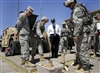 Defense Secretary Robert M. Gates receives a future combat systems briefing during a tour of the Future Forces Integration Directorate on Fort Bliss in El Paso, Texas, May 1, 2008.  