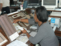 A flight data coordinator adjusts flight orders