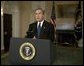 President George W. Bush addresses the nation on the capture of Saddam Hussein from the Cabinet Room, Sunday, Dec. 14, 2003. White House photo by Eric Draper.