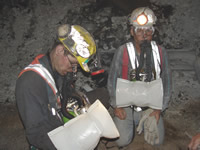 Miners training the use of SCSR equipment