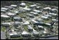 President George W. Bush, aboard Marine One, surveys hurricane damage over Fort Myers, Fla., Sunday, Aug. 15, 2004. White House photo by Eric Draper.