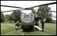 President George W. Bush waves from Marine One upon his departure from the South Lawn Tuesday, Aug. 3, 2004. White House photo by Tina Hager.