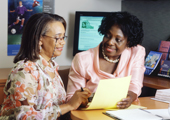 Photo of two institute staff members in a meeting