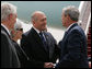 President George W. Bush is greeted by Israel’s Prime Minister Ehud Olmert and Mrs. Aliza Olmert as he deplanes Air Force One Wednesday, May 14, 2008, with Mrs. Laura Bush in Tel Aviv. The President and First Lady will spend two nights in Jerusalem before continuing on to Saudi Arabia and Egypt. White House photo by Joyce N. Boghosian