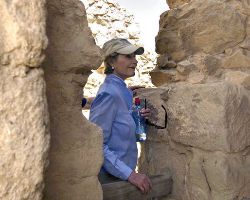 Mrs. Laura Bush pauses during her tour of Masada National Park Thursday, May 15, 2008. The palatial fortress built by King Herod of Judea, sits atop a plateau overlooking the Judean Desert. White House photo by Joyce N. Boghosian