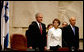 President George W. Bush stands with Dalia Itzik, Speaker of the Knesset, and Israel’s President Shimon Peres on the floor of the Knesset Thursday, May 15, 2008, in Jerusalem. During his remarks to the members of the Israel parliament, President Bush said, “We gather to mark a momentous occasion. Sixty years ago in Tel Aviv, David Ben-Gurion proclaimed Israel's independence, founded on the "natural right of the Jewish people to be masters of their own fate." What followed was more than the establishment of a new country. It was the redemption of an ancient promise given to Abraham and Moses and David -- a homeland for the chosen people Eretz Yisrael.” White House photo by Shealah Craighead