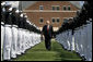 Vice President Dick Cheney walks through an honor cordon of U.S. Coast Guard cadets, Wednesday, May 21, 2008, upon his arrival to the U.S. Coast Guard Academy commencement ceremony in New London, Conn. White House photo by David Bohrer