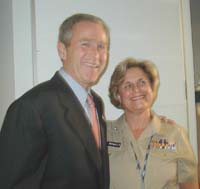 A picture of Laura McNally and President Bush.