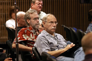 NTP Scientist Bill Jameson, Ph.D., background, Pat Mastin, Ph.D., center, and Jerry Heindel, Ph.D., both of DERT, listened as Olden described his vision of a policy and evaluation mechanism with more public involvement. (Photo courtesy of Steve McCaw)