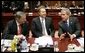 During a meeting with European Union Leaders at the EU Council Building in Brussels, President George W. Bush talks with Austrian Chancellor Wolfgang Schuessel, left, of Austria, and Prime Minister Blair of Britain,Tuesday, Feb. 22, 2005. White House photo by Eric Draper