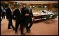 After meeting with European Union leaders, President George W. Bush walks with EU President Jean-Claude Juncker at Justus Lipsius in Brussels. White House photo by Eric Draper