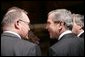 President George W. Bush shares a light moment with Sweden's Prime Minister Goeran Persson Tuesday, Feb. 22, 2005, during European Summit talks in Brussels. White House photo by Eric Draper