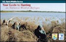 Cover of NWRS Hunting Guide.  Three hunters hiding in the brush overlooking water with rifles pointed.