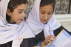 Photo: Afghan girls reading