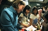 U.S. Navy Lt. j.g. Melissa Gonzales plays with Indonesian children at the Murni Jaya Orphanage in Jakarta, Indonesia, May 14, 2008. USS Blue Ridge and 7th Fleet Staff sailors visited the orphanage to interact with the children and bring them school supplies, hygiene items and books. 