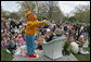 White House Chief of Staff Josh Bolten gets a little help from Arthur in telling his tale of, "Arthur Meets the President," by Marc Brown Monday, April 9, 2007, on the South Lawn during the 2007 White House Easter Egg Roll. White House photo by Joyce Boghosian