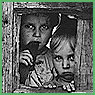 Between Weedpatch and Lamont, Kern County, California. Children Living in Camp..., 4/12/1940 [Photograph by Dorothea Lange] (ARC Identifier 521700)