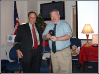 Region II Administrator Stephen Kempf (left) presents Sean Waters with the agency’s first 'Employee of the Year Award.'