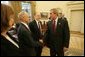 President George W. Bush greets Dr. Finn Kydland during a ceremony honoring the 2004 Nobel Laureates in the Oval Office Wednesday, Dec. 1, 2004. Dr. Kydland received the Nobel Prize in Economics for his analyzation of the driving forces behind business cycles has influenced the practice of economic and monetary policy.White House photo by Tina Hager