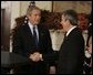 President George W. Bush greets Nebraska Governor Mike Johanns after nominating him for Secretary of Agriculture in the Roosevelt Room of the White House, Dec. 2, 2004. White House photo by Paul Morse.