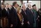 Vice President Dick Cheney and his wife, Lynne, attend the swearing-in ceremony for Afghanistan President Hamid Karzai at Salaam Khana in Kabul, Afghanistan, Dec. 7, 2004. President Karzai is Afghanistan’s first democratically-elected president in Afghanistan's history. Also pictured, from left back, Secretary of Defense Donald Rumsfeld, Afghanistan Vice President Hedayat Amin Arsala, left front; U.S. Ambassador to Afghanistan Zalmay Khalilzad, and Afghanistan President Hamid Karzai, right. White House photo by David Bohrer