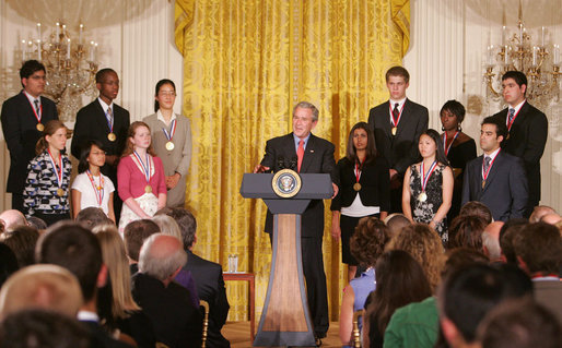 President George W. Bush congratulates the 2007 Presidential Scholars Monday, June 25, 2007 in the East Room of the White House, and highlights the need to reauthorize the No Child Left Behind Act this year. White House photo by Joyce N. Boghosian