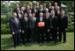 President George W. Bush stands with members of the Auburn University Men's Swimming and Diving 2007 Championship Team Monday, June 18, 2007 at the White House, during a photo opportunity with the 2006 and 2007 NCAA Sports Champions. White House photo by Chris Greenberg