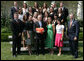 President George W. Bush stands with members of the Auburn University Women's Swimming and Diving 2007 Championship Team Monday, June 18, 2007 at the White House, during a photo opportunity with the 2006 and 2007 NCAA Sports Champions. White House photo by Chris Greenberg