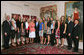 President George W. Bush stands with members of the University of Nebraska Women's Volleyball 2006 Championship Team Monday, June 18, 2007 at the White House, during a photo opportunity with the 2006 and 2007 NCAA Sports Champions. White House photo by Joyce N. Boghosian