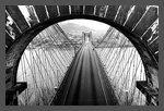 View through an arch of the east tower of the Wheeling suspension bridge