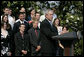 President George W. Bush delivers remarks to the 2006 and 2007 NCAA Championship teams Monday, June 18, 2007 on the South Lawn. White House photo by Eric Draper