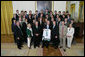 President George W. Bush stands with members of the Michigan State University Men's Ice Hockey 2007 Championship Team Monday, June 18, 2007 at the White House, during a photo opportunity with the 2006 and 2007 NCAA Sports Champions. White House photo by Eric Draper