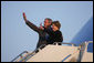 President George W. Bush and Mrs. Laura Bush wave as they board Air Force One for departure from Poland Friday, June 8, 2007, at Gdansk Lech Walesa International Airport in Gdansk. White House photo by Chris Greenberg