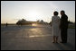 Polish President Lech Kaczynski and his wife, Maria, wait to greet President George W. Bush and Mrs. Laura Bush arriving aboard Marine One, on their trip back to Gdansk after visiting the presidential retreat in Jurata, Poland, Friday, June 8, 2007. White House photo by Eric Draper