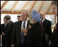 President George W. Bush talks briefly with Prime Minister Manmohan Singh of India, Friday, June 8, 2007, after a G8 working session with Outreach Representatives at the Kempinski Grand Hotel in Heiligendamm, Germany. White House photo by Eric Draper