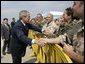 President George W. Bush greets military personnel Thursday, June 28, 2007, at the Rhode Island Air National Guard facility in Kingston, R.I., prior to leaving for Kennebunkport, Maine, where President Bush is scheduled to meet with Russian President Vladimir Putin July 1-2, 2007. White House photo by Eric Draper