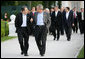 President George W. Bush walks with Prime Minister Romano Prodi of Italy, after dinner Thursday evening, June 7, 2007, for the G8 leaders at the Kempinski Grand Hotel in Heiligendamm, Germany. White House photo by Eric Draper