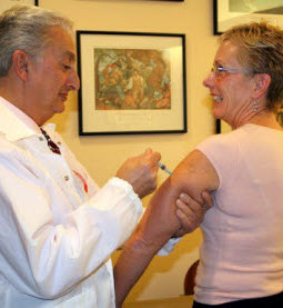 Pharmacist Administers Flu Vaccine
