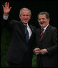 President George W. Bush and Prime Minister Romano Prodi of Italy embrace following their joint statement Saturday, June 9, 2007, at the Chigi Palace in Rome. White House photo by Chris Greenberg