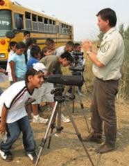 [Photograph]: Students observing wildlife at US Fish and Wildlife Service, Sacramento National Wildlife Refuge during Outdoor Adventures program.