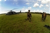 U.S. Air Force pararescuemen from the 38th Rescue Squadron carry a simulated patient to an HH-60G Pave Hawk helicopter during a mass casualty exercise on Moody Air Force Base, Ga., June 27, 2008.